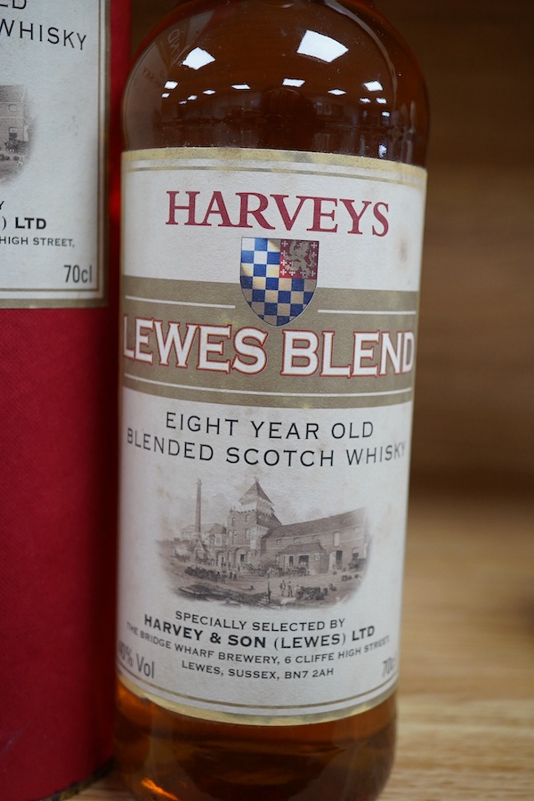 A bottle of Harveys Lewes Blend eight-year old whisky with case. Condition - good